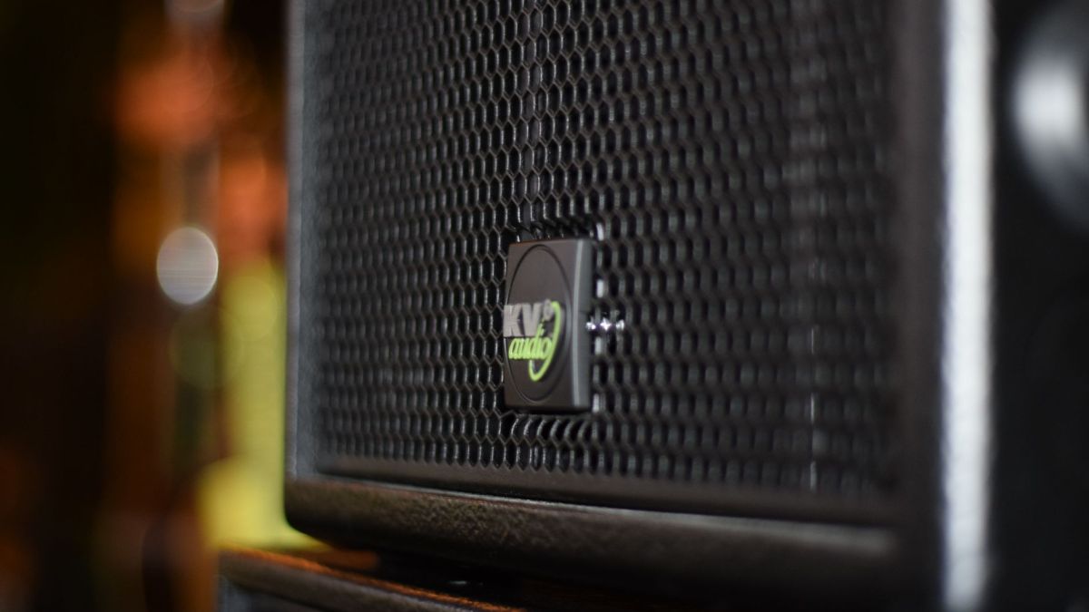 Detailed shot of a KV2 audio speaker showcasing its design in an indoor setting.