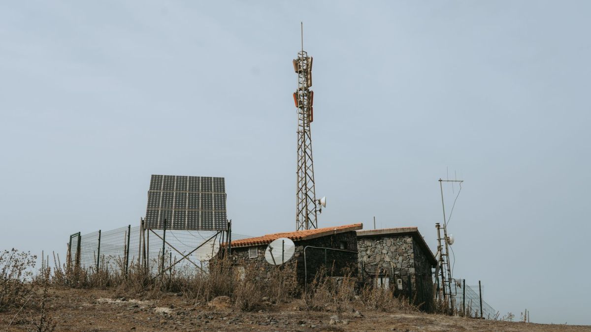 Rural remote station featuring solar panels and communication towers in the Canary Islands, Spain.