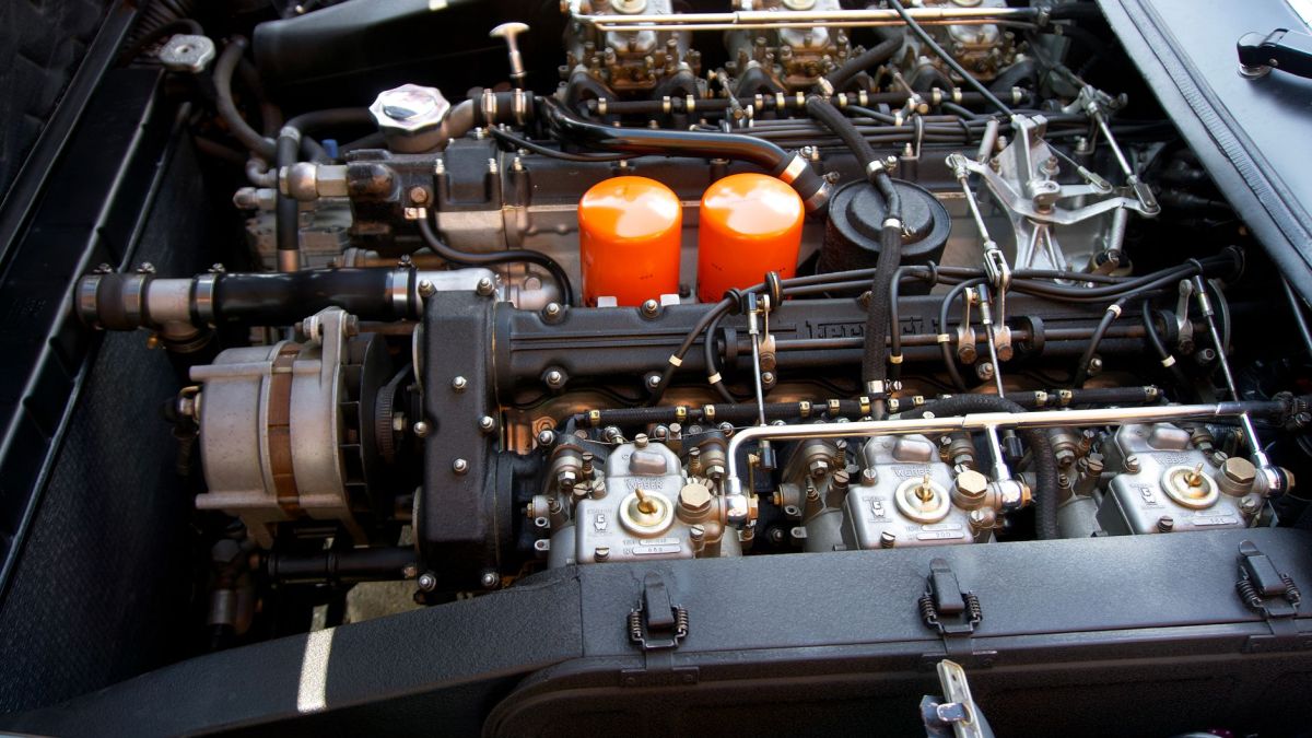 Close-up of an intricate sports car engine showcasing technology and engineering.