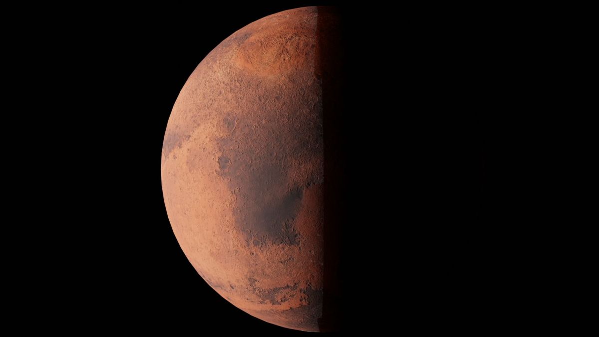 Stunning image of Mars half-illuminated against the blackness of space.