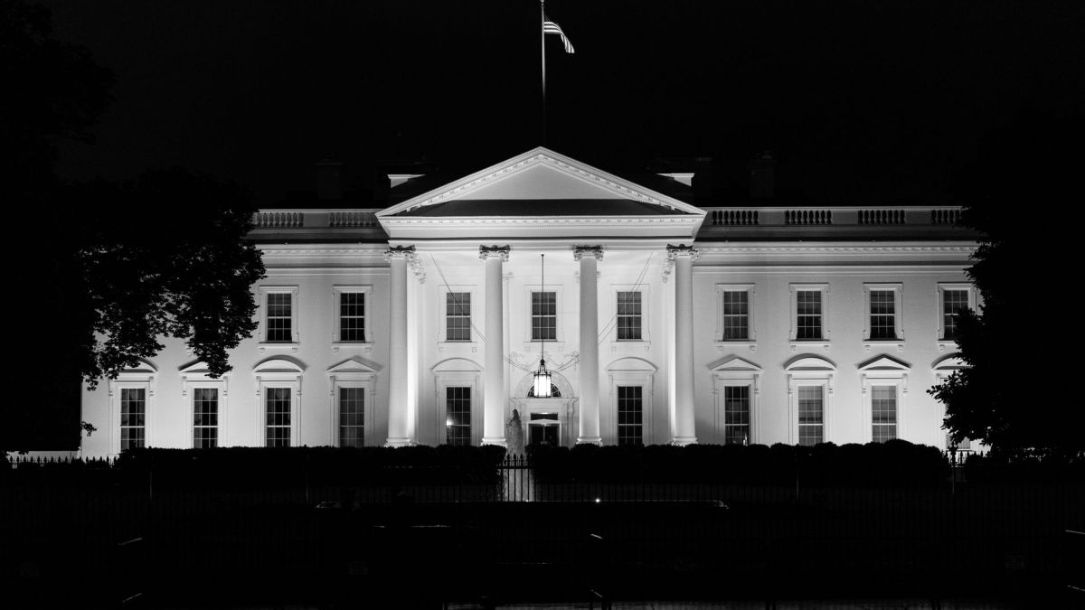 The iconic White House illuminated at night, Washington, D.C., USA.