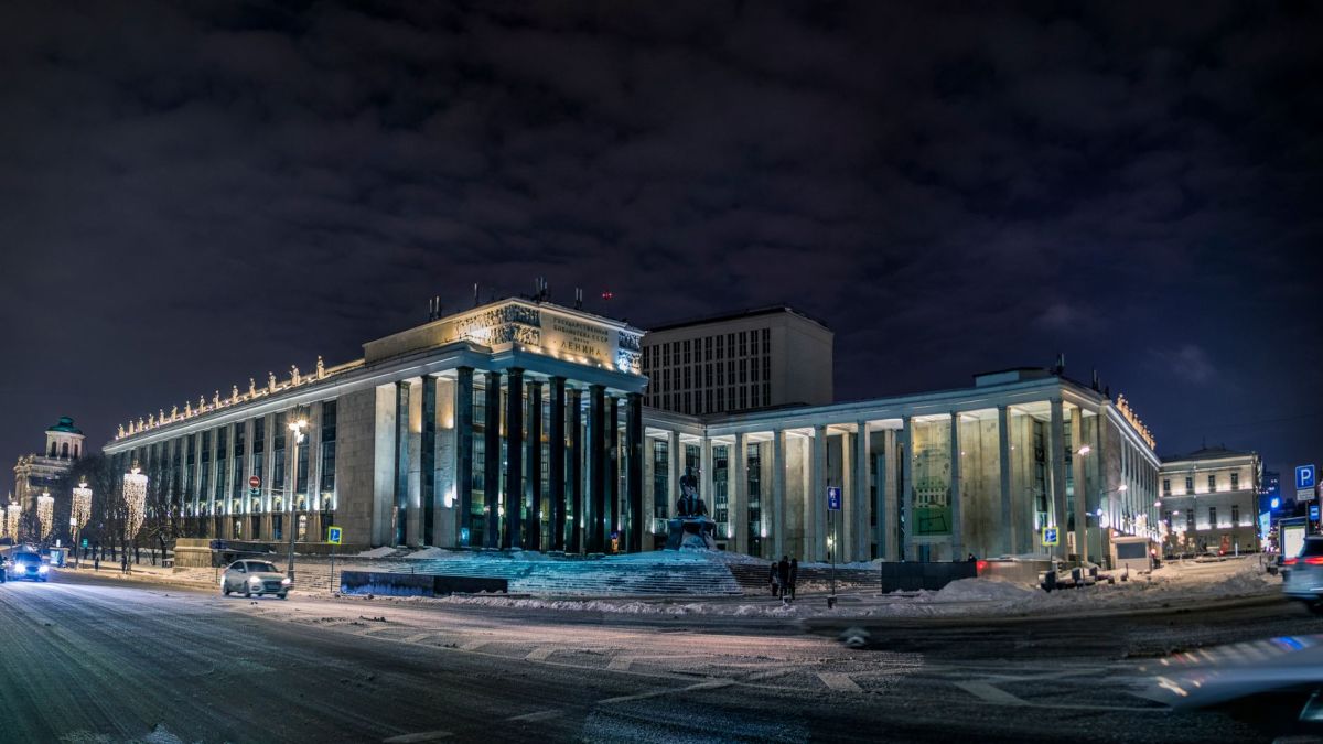 Stunning night scene of illuminated architectural landmark in Ust'-Kamenogorsk, Kazakhstan.