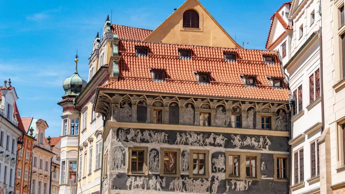 Beautiful Renaissance architectural facade in historic old town, showcasing intricate murals.