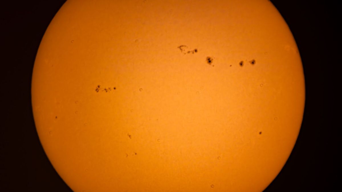 A high-resolution image capturing the Sun's surface with visible sunspots, ideal for astronomical study.