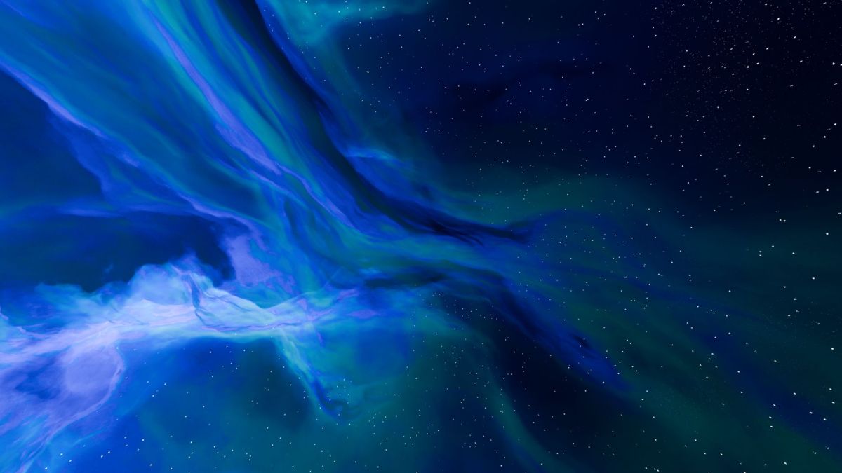 Stunning aurora borealis illuminating the dark starry night sky in vivid blue and green hues.