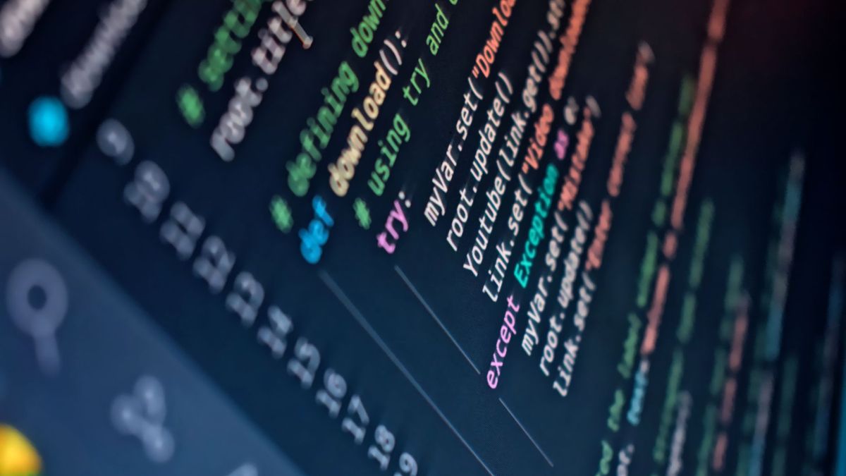 Close-up of a computer screen displaying colorful programming code with depth of field.