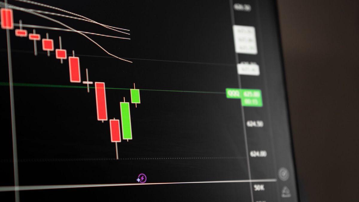 Candlestick chart showing a downward trend in the stock market analysis.