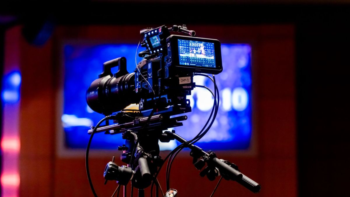High-tech video camera setup in modern studio environment, showcasing professional equipment for filming.